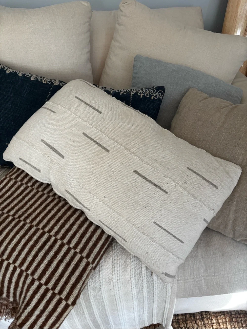 Cream Decorative Lumbar Pillow with Subtle Gray Stitching